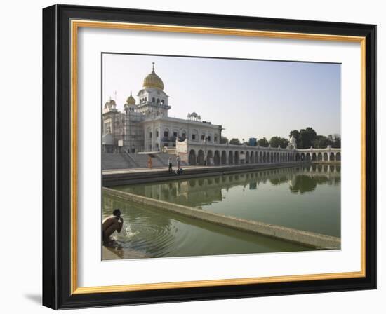 Sikh Pilgrim Bathing in the Pool of the Gurudwara Bangla Sahib Temple, Delhi, India-Eitan Simanor-Framed Photographic Print