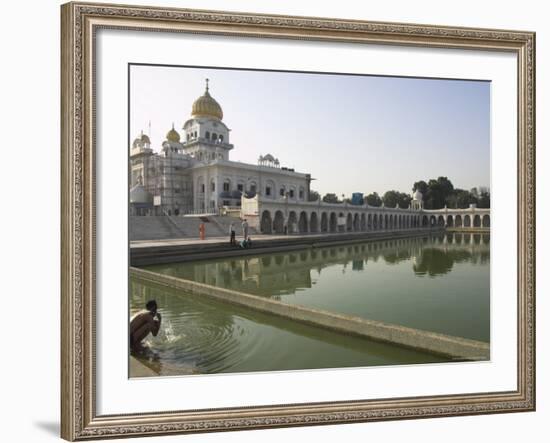 Sikh Pilgrim Bathing in the Pool of the Gurudwara Bangla Sahib Temple, Delhi, India-Eitan Simanor-Framed Photographic Print