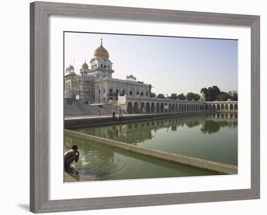 Sikh Pilgrim Bathing in the Pool of the Gurudwara Bangla Sahib Temple, Delhi, India-Eitan Simanor-Framed Photographic Print