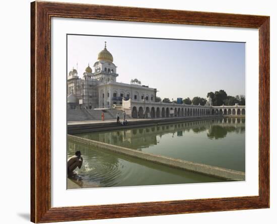 Sikh Pilgrim Bathing in the Pool of the Gurudwara Bangla Sahib Temple, Delhi, India-Eitan Simanor-Framed Photographic Print