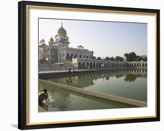 Sikh Pilgrim Bathing in the Pool of the Gurudwara Bangla Sahib Temple, Delhi, India-Eitan Simanor-Framed Photographic Print