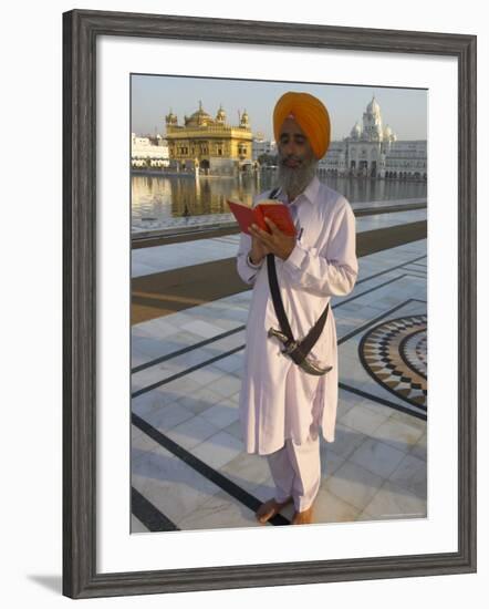 Sikh Pilgrim with Orange Turban, White Dress and Dagger, Reading Prayer Book, Amritsar-Eitan Simanor-Framed Photographic Print