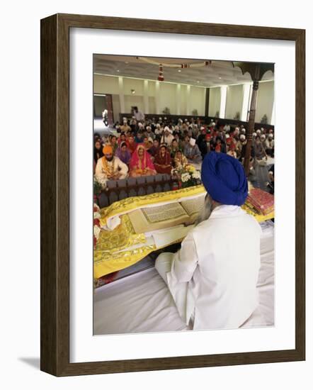 Sikh Priest and Holy Book at Sikh Wedding, London, England, United Kingdom-Charles Bowman-Framed Photographic Print