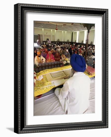 Sikh Priest and Holy Book at Sikh Wedding, London, England, United Kingdom-Charles Bowman-Framed Photographic Print