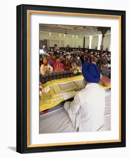 Sikh Priest and Holy Book at Sikh Wedding, London, England, United Kingdom-Charles Bowman-Framed Photographic Print