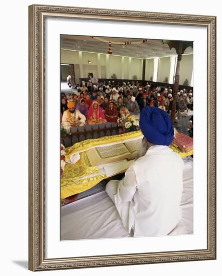 Sikh Priest and Holy Book at Sikh Wedding, London, England, United Kingdom-Charles Bowman-Framed Photographic Print