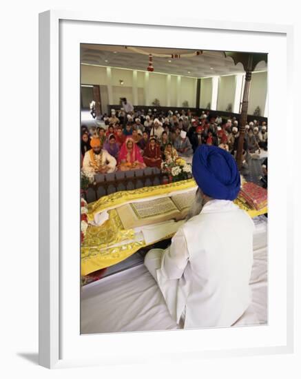 Sikh Priest and Holy Book at Sikh Wedding, London, England, United Kingdom-Charles Bowman-Framed Photographic Print