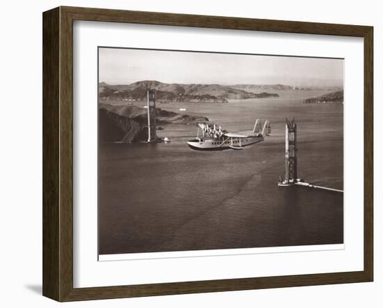 Sikorsky S-42 through the Golden Gate under Construction, San Francisco, 1935-Clyde Sunderland-Framed Art Print