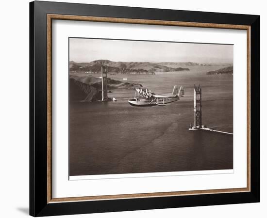 Sikorsky S-42 through the Golden Gate under Construction, San Francisco, 1935-Clyde Sunderland-Framed Art Print