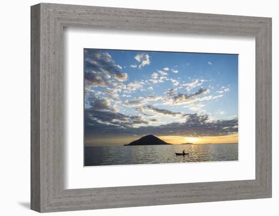 Silhouette of a Man in a Little Fishing Boat at Sunset, Cape Malcear, Lake Malawi, Malawi, Africa-Michael Runkel-Framed Photographic Print