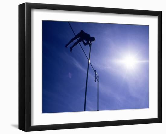 Silhouette of a Pole Vaulter in Action-null-Framed Photographic Print