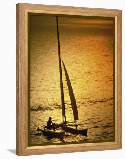 Silhouette of a Sailboat in the Sea-null-Framed Premier Image Canvas