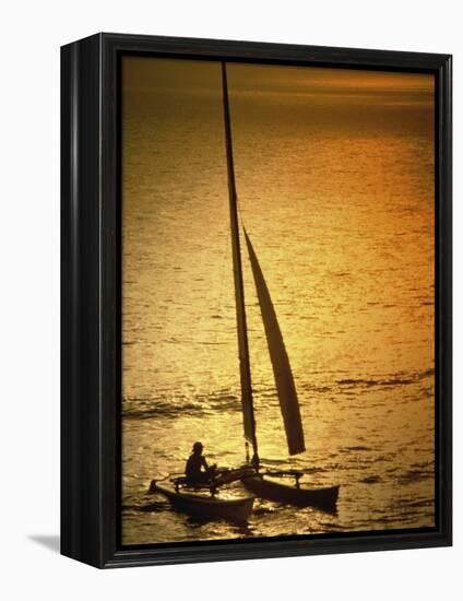 Silhouette of a Sailboat in the Sea-null-Framed Premier Image Canvas