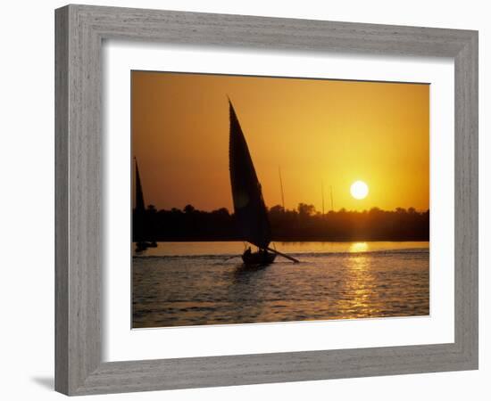 Silhouette of a traditional Egyptian Falucca, Nile River, Luxor, Egypt-Janis Miglavs-Framed Photographic Print