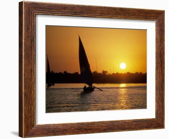 Silhouette of a traditional Egyptian Falucca, Nile River, Luxor, Egypt-Janis Miglavs-Framed Photographic Print