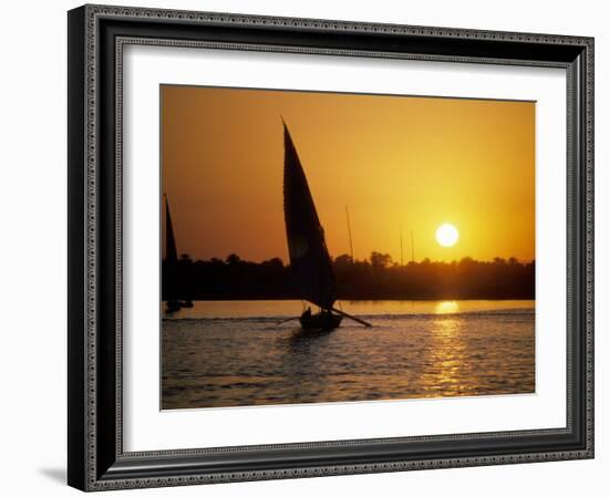 Silhouette of a traditional Egyptian Falucca, Nile River, Luxor, Egypt-Janis Miglavs-Framed Photographic Print