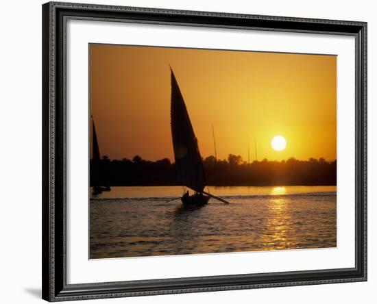 Silhouette of a traditional Egyptian Falucca, Nile River, Luxor, Egypt-Janis Miglavs-Framed Photographic Print