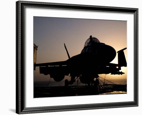 Silhouette of a US Navy F/A-18E Super Hornet on the Flight Deck of USS Nimitz-Stocktrek Images-Framed Photographic Print