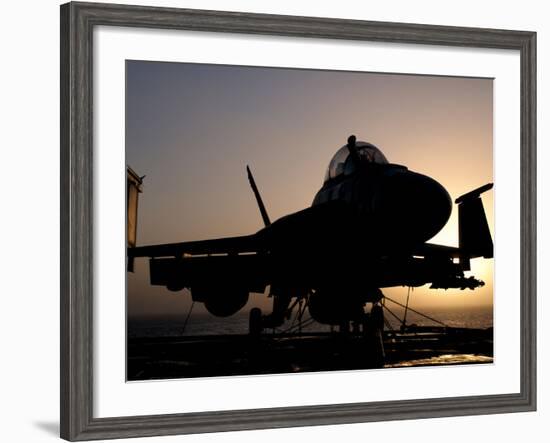 Silhouette of a US Navy F/A-18E Super Hornet on the Flight Deck of USS Nimitz-Stocktrek Images-Framed Photographic Print