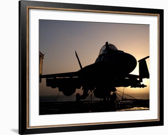 Silhouette of a US Navy F/A-18E Super Hornet on the Flight Deck of USS Nimitz-Stocktrek Images-Framed Photographic Print