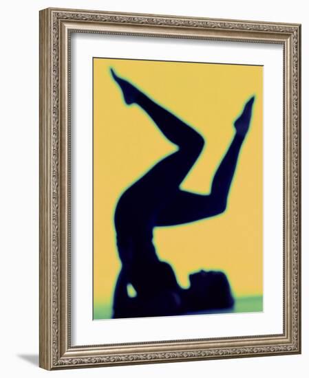 Silhouette of a Woman Exercising-null-Framed Photographic Print