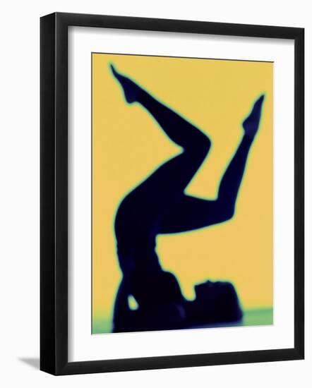 Silhouette of a Woman Exercising-null-Framed Photographic Print