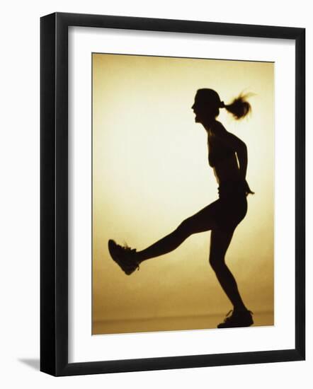 Silhouette of a Young Woman Exercising-null-Framed Photographic Print