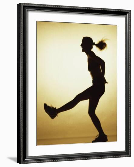 Silhouette of a Young Woman Exercising-null-Framed Photographic Print