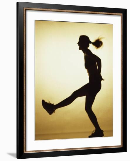 Silhouette of a Young Woman Exercising-null-Framed Photographic Print