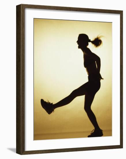 Silhouette of a Young Woman Exercising-null-Framed Photographic Print