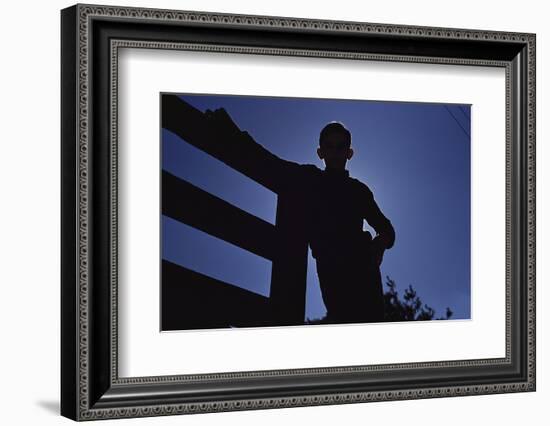 Silhouette of Boy Leaning Against Fence-William P. Gottlieb-Framed Photographic Print