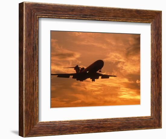 Silhouette of Commercial Airplane at Sunset-Mitch Diamond-Framed Photographic Print