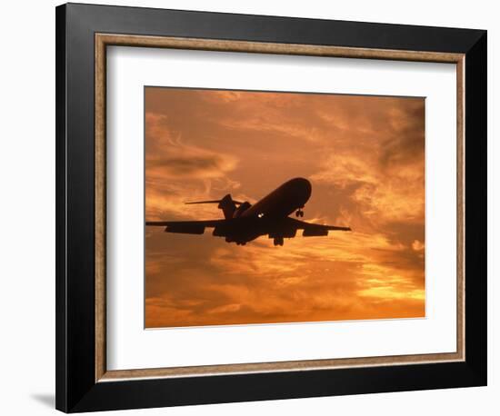 Silhouette of Commercial Airplane at Sunset-Mitch Diamond-Framed Photographic Print