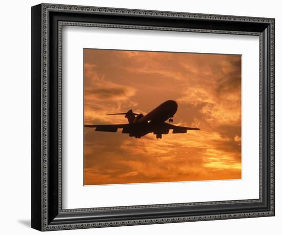 Silhouette of Commercial Airplane at Sunset-Mitch Diamond-Framed Photographic Print