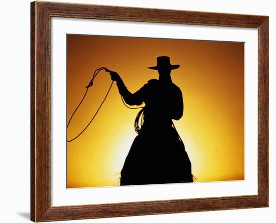 Silhouette of Cowboy on Horse Holding Rope-Darrell Gulin-Framed Photographic Print