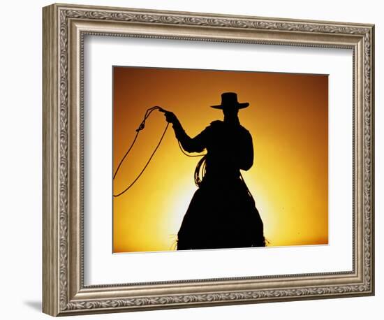 Silhouette of Cowboy on Horse Holding Rope-Darrell Gulin-Framed Photographic Print