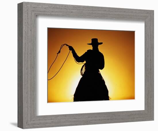 Silhouette of Cowboy on Horse Holding Rope-Darrell Gulin-Framed Photographic Print