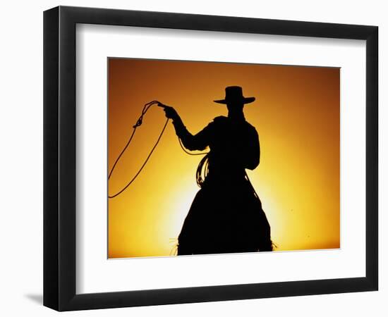 Silhouette of Cowboy on Horse Holding Rope-Darrell Gulin-Framed Photographic Print