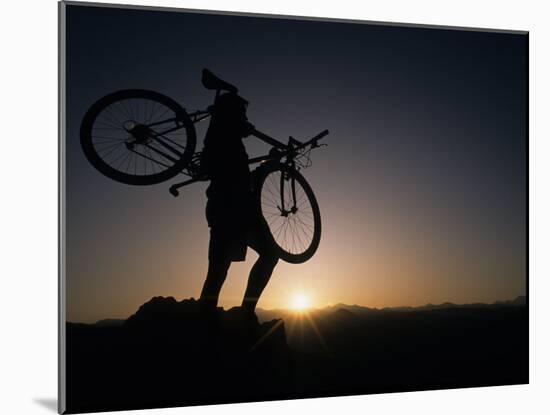 Silhouette of Cyclistist at Sunrise, Boulder, Colorado, USA-null-Mounted Photographic Print