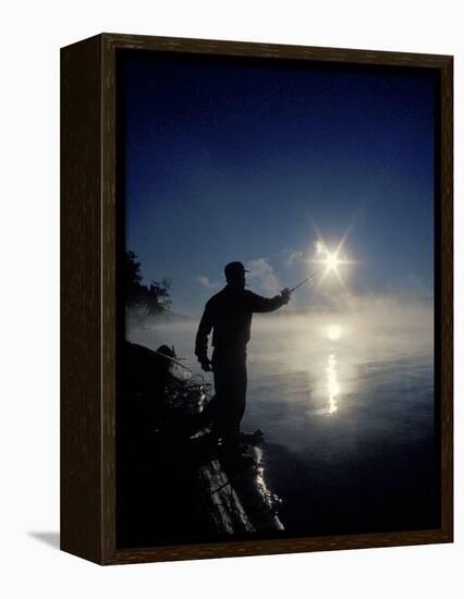 Silhouette of Fisherman Casting a Line into Lake, Ontario, Canada-Mark Carlson-Framed Premier Image Canvas