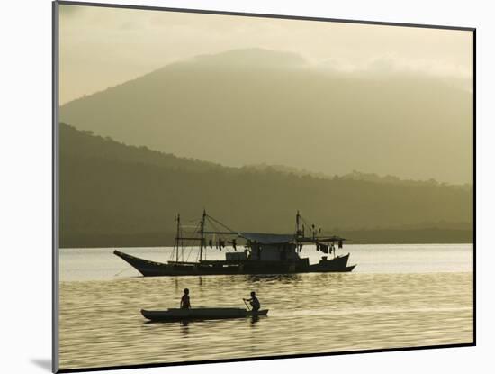 Silhouette of Fishing Boat at Sunset, Puerto Princesa, Palawan, Philippines, Southeast Asia-Kober Christian-Mounted Photographic Print