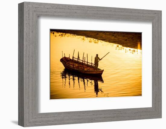 Silhouette of Indian Gondolier During the Flower Holi Festival, Vrindavan, Uttar Pradesh-Laura Grier-Framed Photographic Print