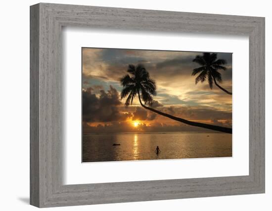 Silhouette of leaning palm trees and a woman at sunrise on Taveuni Island, Fiji, Pacific-Don Mammoser-Framed Photographic Print