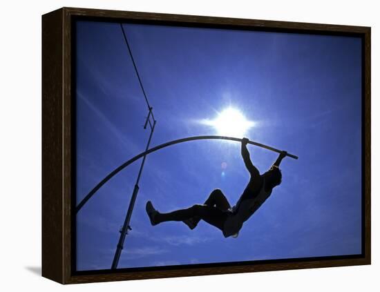 Silhouette of Male Pole Vaulter-Steven Sutton-Framed Premier Image Canvas