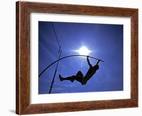 Silhouette of Male Pole Vaulter-Steven Sutton-Framed Photographic Print