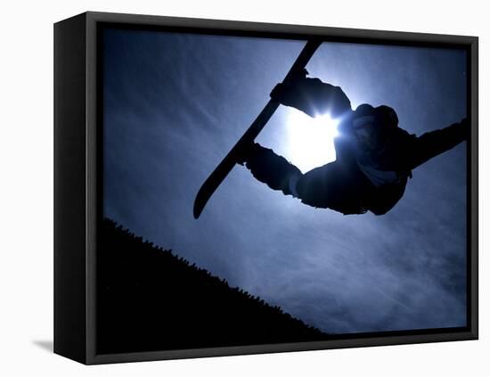 Silhouette of Male Snowboarder Flying over the Vert, Salt Lake City, Utah, USA-Chris Trotman-Framed Premier Image Canvas