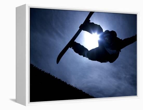 Silhouette of Male Snowboarder Flying over the Vert, Salt Lake City, Utah, USA-Chris Trotman-Framed Premier Image Canvas