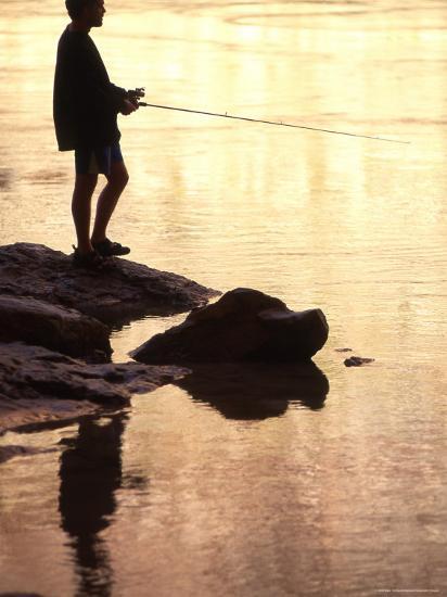 Silhouette Of Man Fishing From The Edge Of The River Colorado Photographic Print By Kate Thompson Art Com