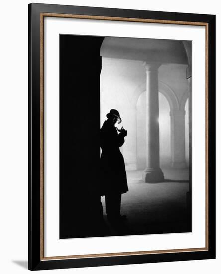 Silhouette of Man Lighting Pipe-null-Framed Photographic Print