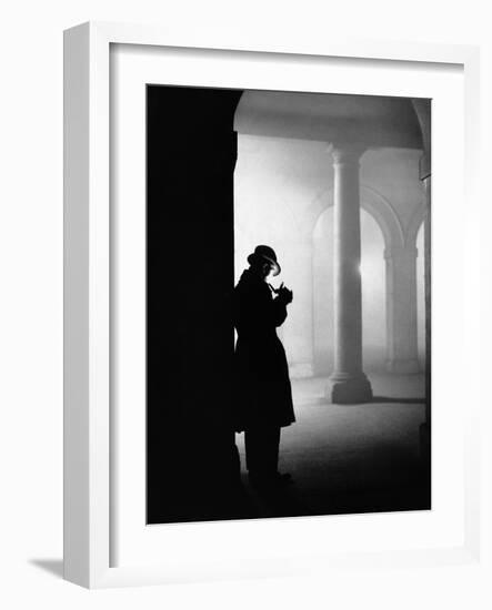 Silhouette of Man Lighting Pipe-null-Framed Photographic Print